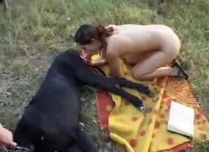 Gorgeous brunette gives a sloppy blowjob to a doggie